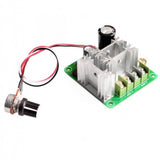 DC Motor Speed Controller DC 6V-90V 15A With Potentiometer - a green circuit board with a silver heatsink, screw terminals, and a wired knob.