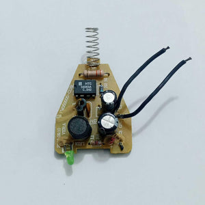 DC To DC Convertor IC 34063A - a spring contact, a green LED, two black electrolytic capacitors, and two black wire leads.