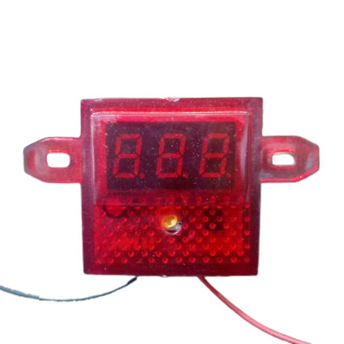 DC Volt Meter 8-30V - a red rectangular digital display module with mounting tabs, a three-digit LED screen, and two trailing wires.