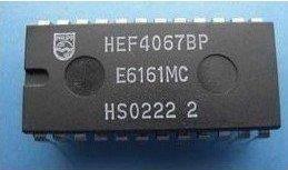 Dell HEF4067B 16-channel Analog Multiplexer Demultiplexer - a black rectangular integrated circuit with metal pins and white text printed on its surface.