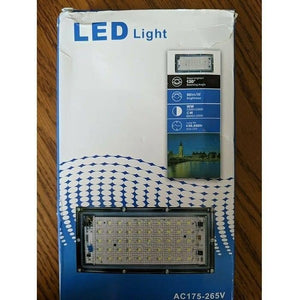 Different Colors Portable Energy Saving Outdoor RGB LED Lights Lamp Floodlight With Remote AC175-265V - shown in its original white and blue cardboard packaging box with printed technical specifications.
