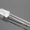 Diffused White LED 5mm In Oval Shape - shown as a single white, semi-transparent oval-shaped LED component with two metallic pins extending from its base.