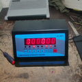 Digital hydraulic Pressure Gauge Metallic Body - a black rectangular unit with a red digital display reading 000000 and front control buttons.
