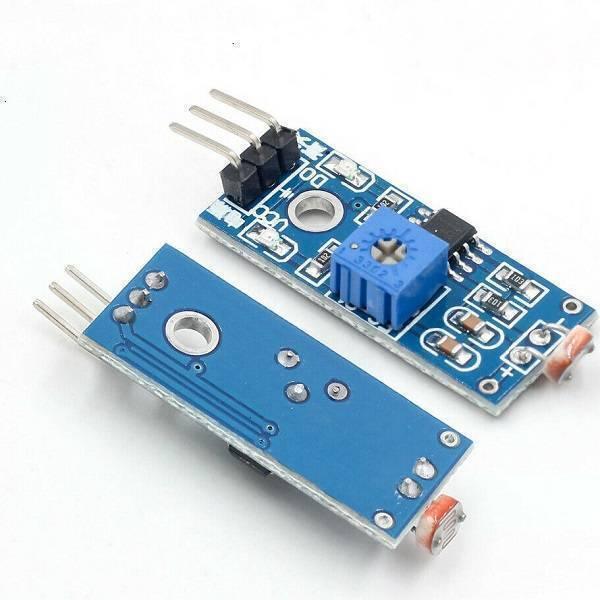 Digital LDR Sensor Module - shown as two blue circuit boards, one displaying the top components including a blue potentiometer and the other showing the back.
