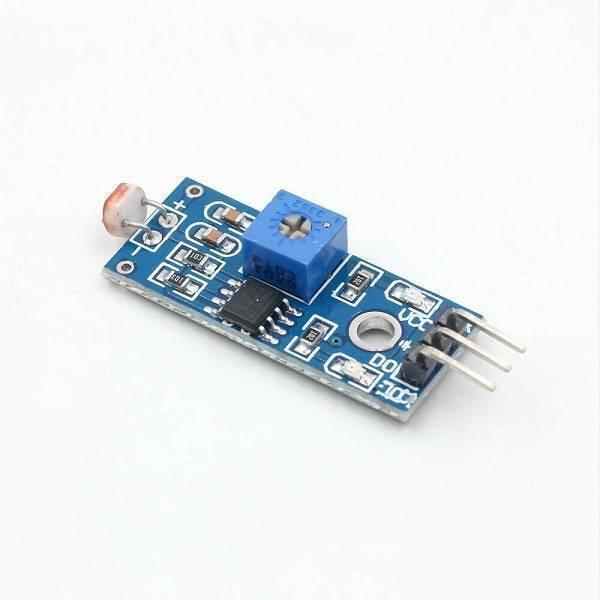 Digital LDR Sensor Module - a blue rectangular circuit board featuring a light-dependent resistor, a blue potentiometer, and a three-pin connector.