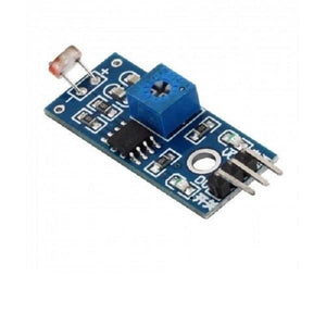 Digital LDR Sensor Module - a blue potentiometer, a light-dependent resistor, an integrated circuit, and a three-pin connector on a blue circuit board.
