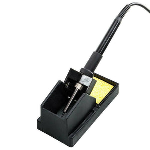 Digital Soldering And SMD Rework Station Kada 852D+ - iron handle resting in a black plastic stand with a yellow cleaning sponge.