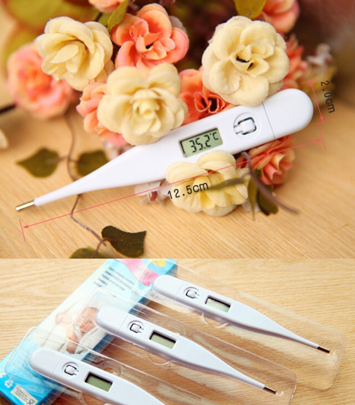 Digital Thermometer - shown with a white plastic body, a digital display reading 35.2°C, and a dimension diagram, plus three units in plastic packaging.