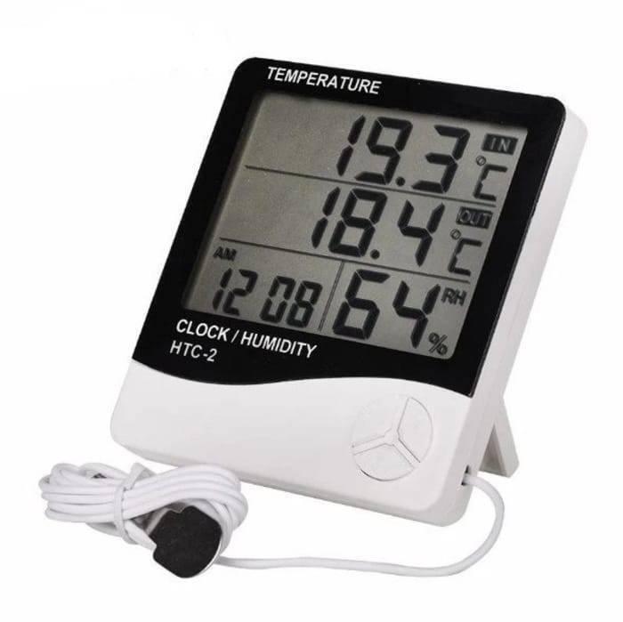 Digital Thermometer And Hygrometer Htc-2 - a white and black device with a digital display showing 19.3°C, 18.4°C, 12:08, and 64% RH with a wired probe.
