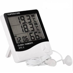 Digital Thermometer And Hygrometer Htc-2 - a white rectangular device with a digital display showing 19.3, 18.3, and 12:06 66%, with a wired external probe.