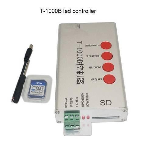 Discontinued Addressable LED Pixel Controller T1000B T-1000B - shown with a silver rectangular body, four red buttons, a green terminal block, an SD card slot, an SD card, and a power cable.