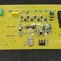 Discontinued Local 8 IGBT 7kVA Solar Inverter PCB with Pre-Assembled Components - a yellow rectangular circuit board with capacitors, resistors, terminal blocks, and IC sockets.