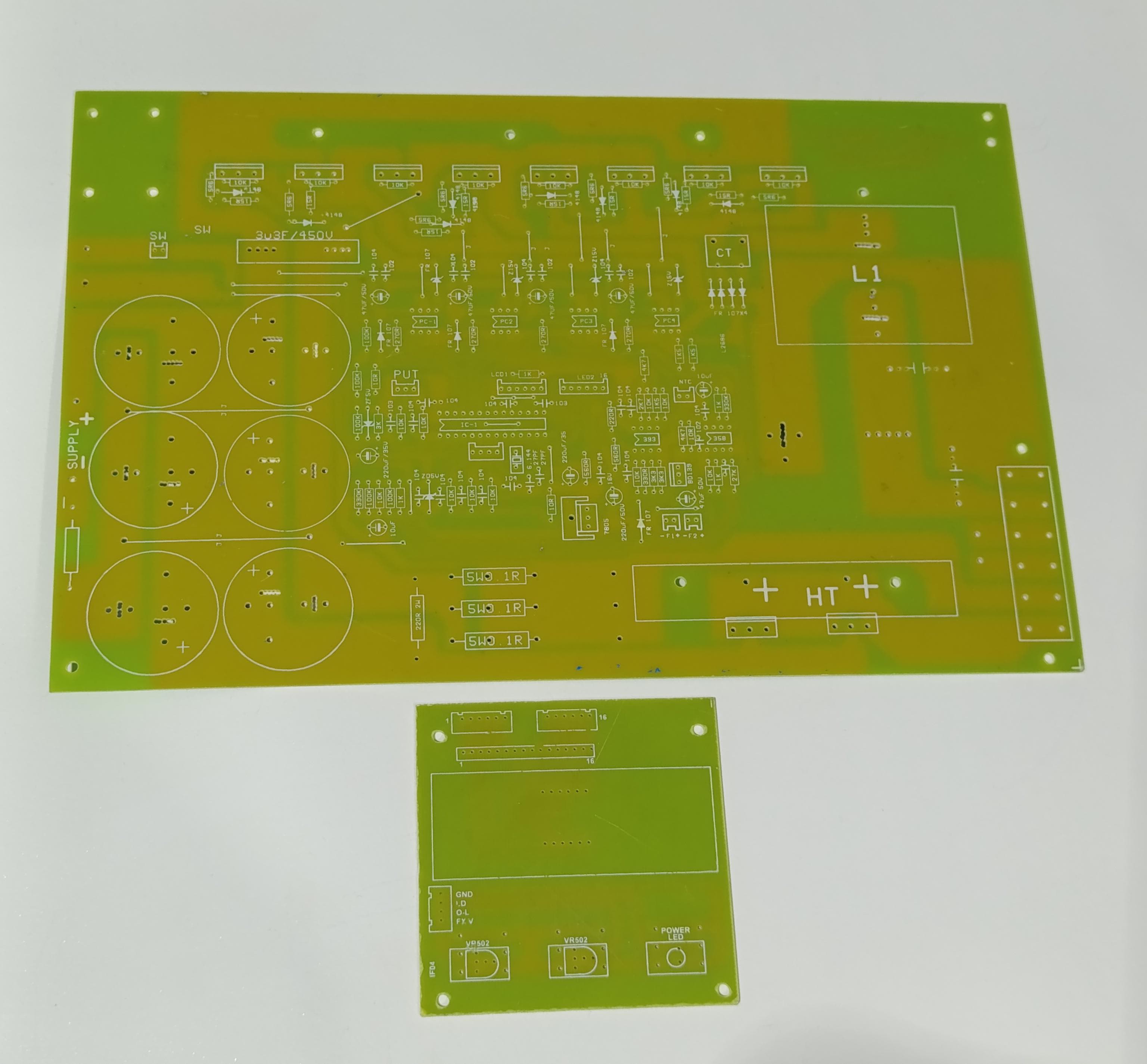 Discontinued Local 8 IGBT Solar Inverter PCB Board - a large green main circuit board and a smaller rectangular green control board.