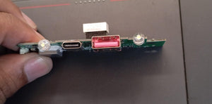 Power Bank Charging Module Board – CSZR-2107A-5356 (4.35V) ( stock LOT ) - a green circuit board featuring a USB-C port, a red USB-A port, and two clear LED indicators.