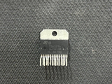 Discontinued TDA7294 100W Audio Power Amplifier IC - TO-220-15 Package - a black rectangular electronic component with fifteen metal pins and a top mounting hole, shown close-up.