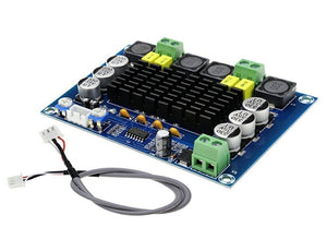 Discontinued XH-M543 TPA3116D2 Dual-channel Class D Digital Audio Power Amplifier Board 50W*2 - with a black heatsink, blue circuit board, green screw terminals, and a cable.