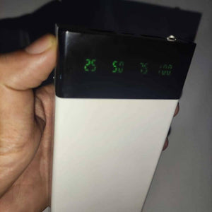 DIY 5V 2A Dual USB Power Bank Case With Power Bank Kit - a white rectangular casing with a black top panel featuring a digital display indicating 25, 50, 75, and 100.