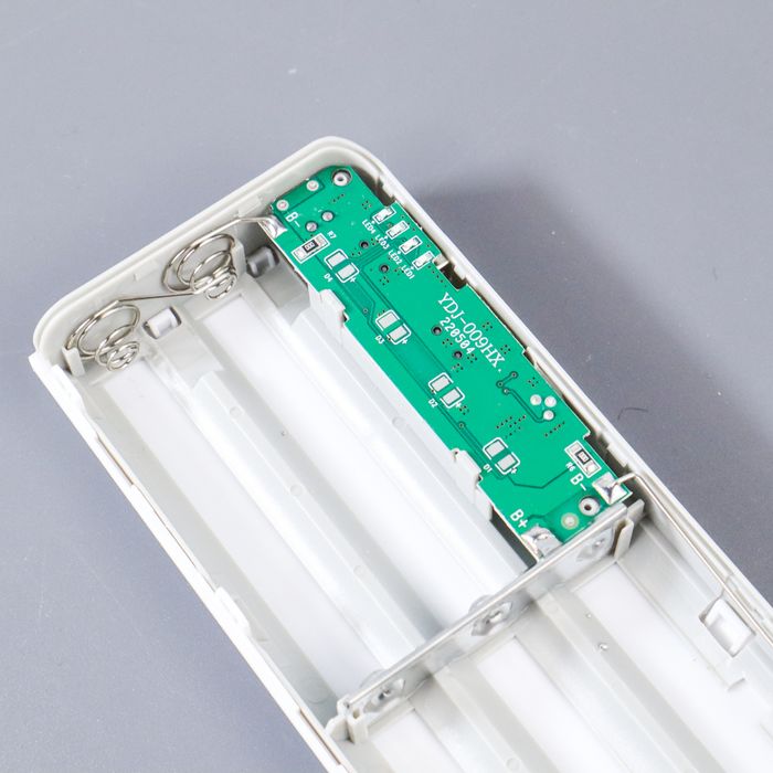 DIY 5x18650 Power Bank Case Dual USB Power Bank Box Shell Dual USB Charging Box With Digital Display Screen(without Battery) - the interior white plastic shell with a green circuit board labeled YDJ-009HX and metal battery contact springs.