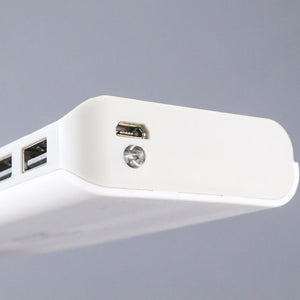 DIY 5x18650 Power Bank Case Dual USB Power Bank Box Shell Dual USB Charging Box With Digital Display Screen(without Battery) - a close-up of the white plastic housing showing two USB output ports, a micro-USB input port, and a circular LED light.