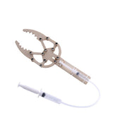 DIY Hydraulic Manipulator Wooden STEM Kit Unassembled - claw mechanism connected by a plastic tube to a handheld syringe.
