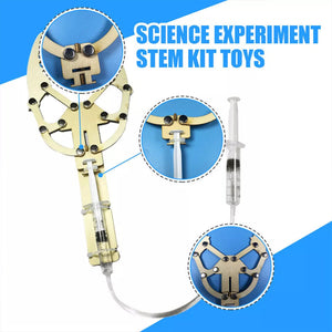 DIY Hydraulic Manipulator Wooden STEM Kit Unassembled - mechanical claw assembly with two plastic syringes connected by a flexible tube.