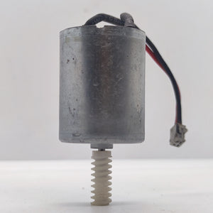 DIY Mini 5vdc DC Motor - shown as a silver cylindrical motor with a white plastic worm gear on the shaft and a short black and red wire with a connector.