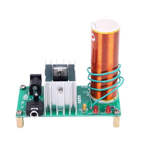DIY Mini Tesla Coil Plasma Speaker Kit Unassembled - an assembled green circuit board with a copper coil, heat sink, power jack, and audio input port.
