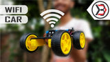 DIY Simple WiFi Controlled Robot Car Parts Not Pre Assembled - shown as a partially assembled yellow-wheeled robot chassis held against a blurred background.