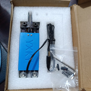 DIY Spot Welder Machine Welding 18650 Battery Handheld Spot Welding Pen Automatic Trigger Built-in Switch Blue - with two probes, a DC power connector, a microswitch, springs, and an Allen key in a foam-lined box.