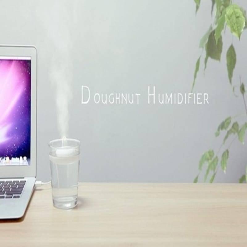 Donuts Shape Mini USB Humidifier Mist Maker Air Diffuser - connected by a white USB cable to a laptop.