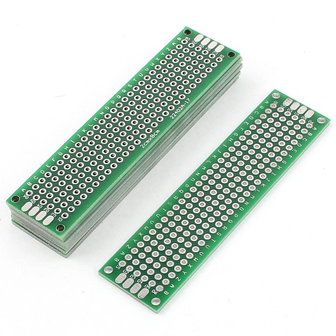 Double Side 2x8 Dotted Veroboard Printed Circuit PCB Prototype Board Project Board - a stack of green rectangular boards and one board lying flat.