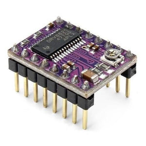 DRV8825 Stepper Motor Driver With Aluminum Heat Sink - a purple circuit board with a black integrated circuit, gold pins, and a small metal adjustment potentiometer.