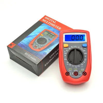 DT33C Digital Multimeter For AC DC Voltage - shown with its black retail box, featuring a red handheld device with a central rotary dial, three ports, and a screen reading 00.0.