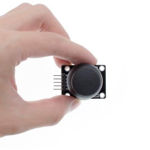 Dual Axis Xy Analog Joystick Module Ky 023 2 Axis PS2 Joystick Control Lever Breakout Sensor - the black circular joystick knob and the five-pin connector on the side.