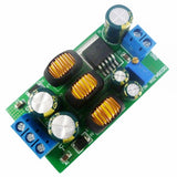Dual Output DC +-5V 6V 9V 10V 12V 15V 24V Power Supply DC Boost-buck Converter Module - a green circuit board with three inductors, two blue screw terminals, capacitors, and an adjustable potentiometer.