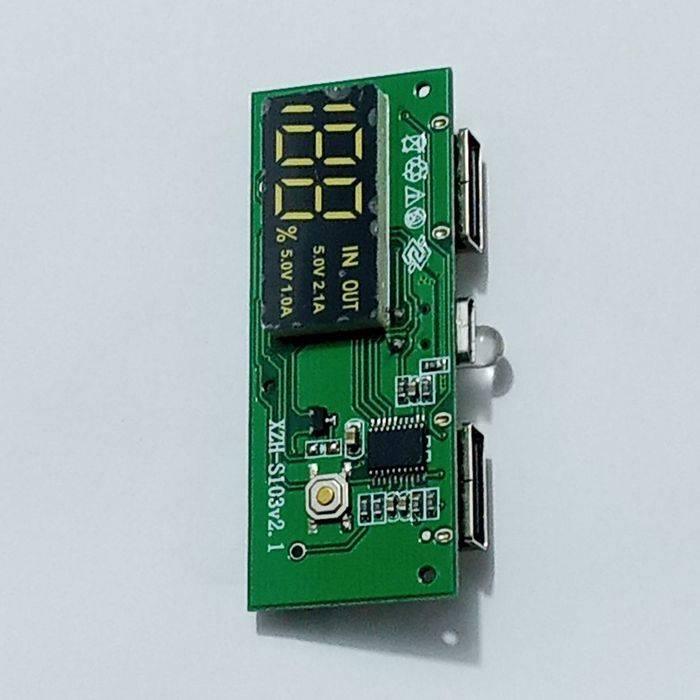 Dual USB 18650 Battery Charger Power Bank Module 5V 1A 2A - a digital display, two USB ports, a button, and an LED light.