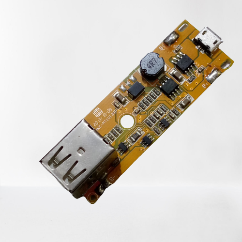 Dual USB 5V 2A Power Bank Module - a yellow circuit board with a micro-USB input port, a USB-A output port, and various electronic components.