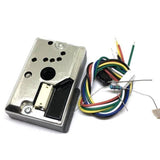 Dust Sensor Module GP2Y1010AU0F Compact Optical Dust Sensor - a metallic sensor unit with a white connector, a bundle of multi-coloured wires, and a loose resistor.