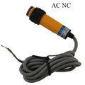 E3f DS10Y1 IR Reflective Photo Sensor AC No 2 Wire Proximity Sensor - a yellow cylindrical sensor with a long grey cable and a label showing wiring.