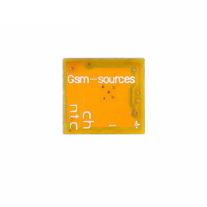 Easy Chip Charge IC Chip Board Module Solve Charging Problem For Mobile Repairing - a close-up of a square, orange circuit board with "Gsm-sources", "ntc", "ch", "+", and "-" printed on it.
