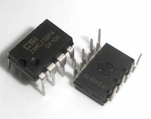 EEPROM Chip IC 24C256 - shown as two black, eight-pin integrated circuit components with white text markings on their surfaces.