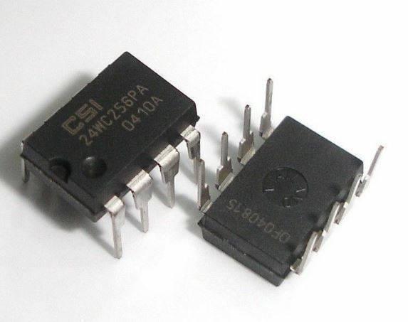 EEPROM Chip IC 24C256 - shown as two black, eight-pin integrated circuit components with white text markings on their surfaces.