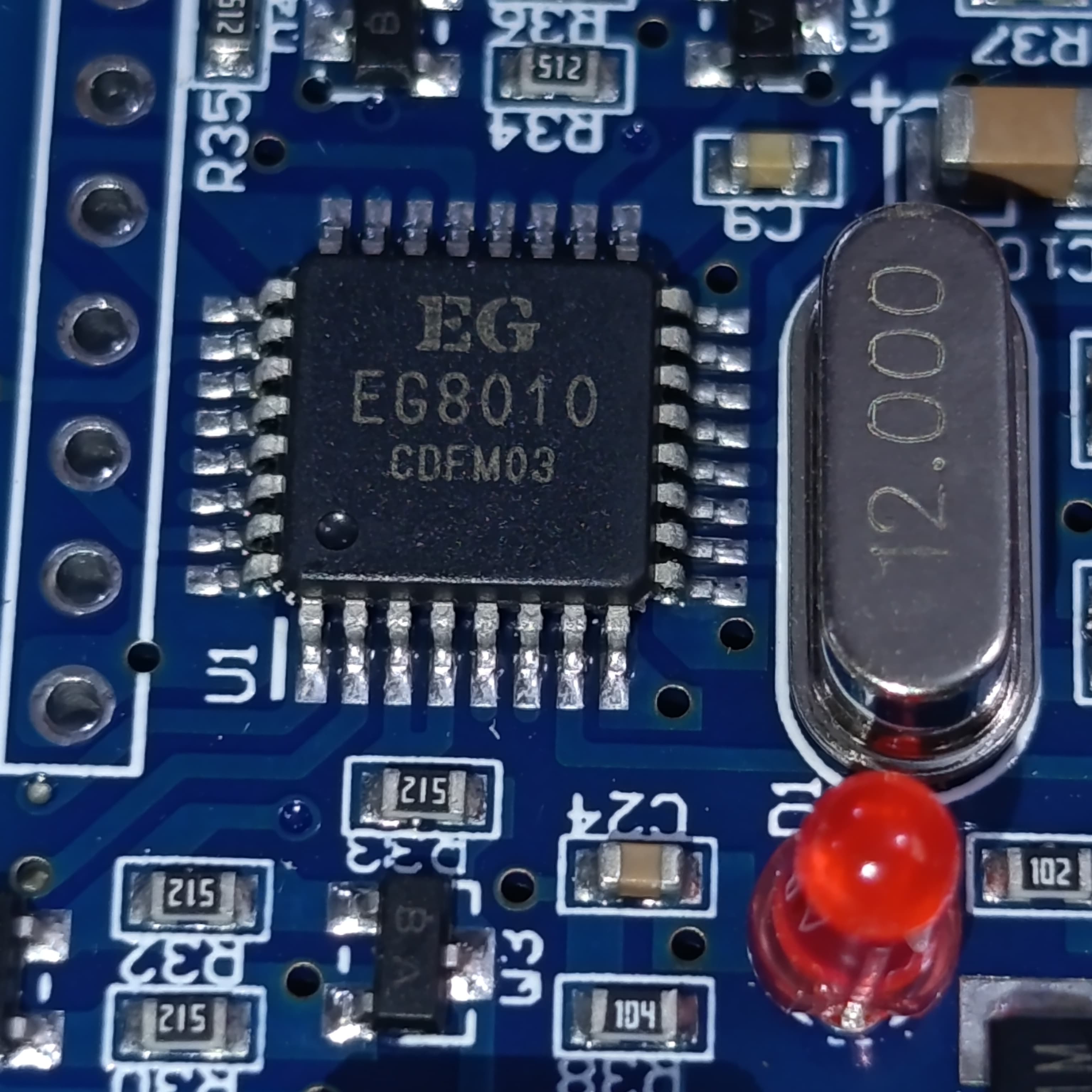 EGS002 EG8010 IR2113 DC To AC Spwm Pure Sine Wave Inverter Module - a close-up of the blue circuit board showing the EG8010 chip, a 12.000 crystal oscillator, and a red LED.