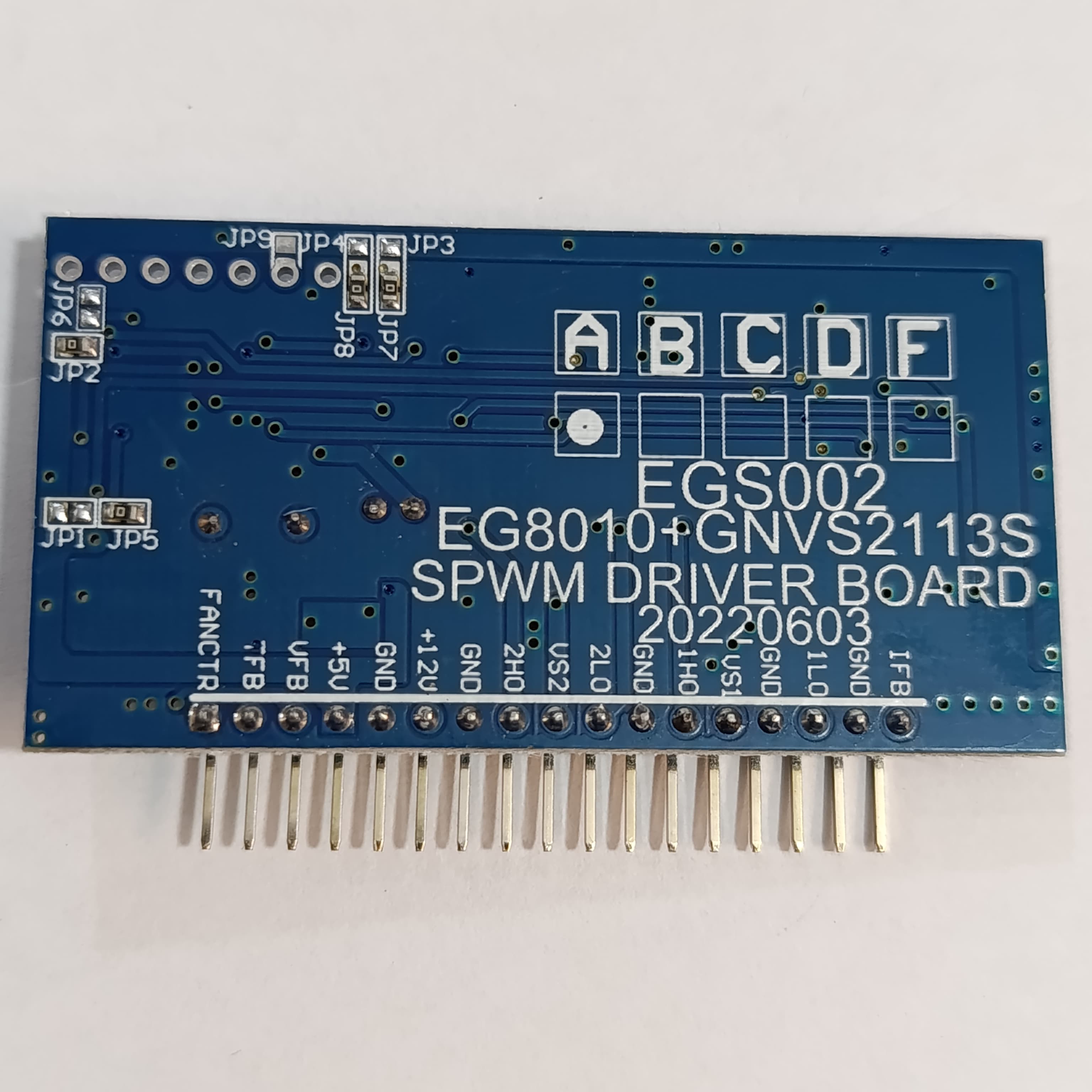 EGS002 EG8010 IR2113 DC To AC Spwm Pure Sine Wave Inverter Module - a blue rectangular circuit board with a row of header pins and printed labels for various input and output ports.