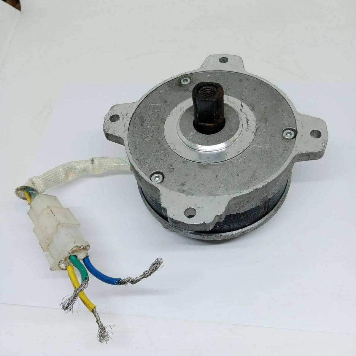 Electric Bike Electric Cycle BLDC Motor Controller And Throttle Handle Accelerator - a circular silver metal motor with a central threaded shaft and a white plastic connector with three exposed wire ends.
