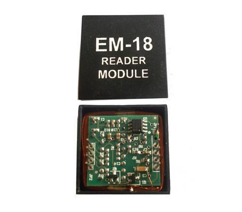 Em-18 EM18 RFID Reader Module - shown with its black top cover removed, revealing the green circuit board with copper coil and pin headers inside the base.