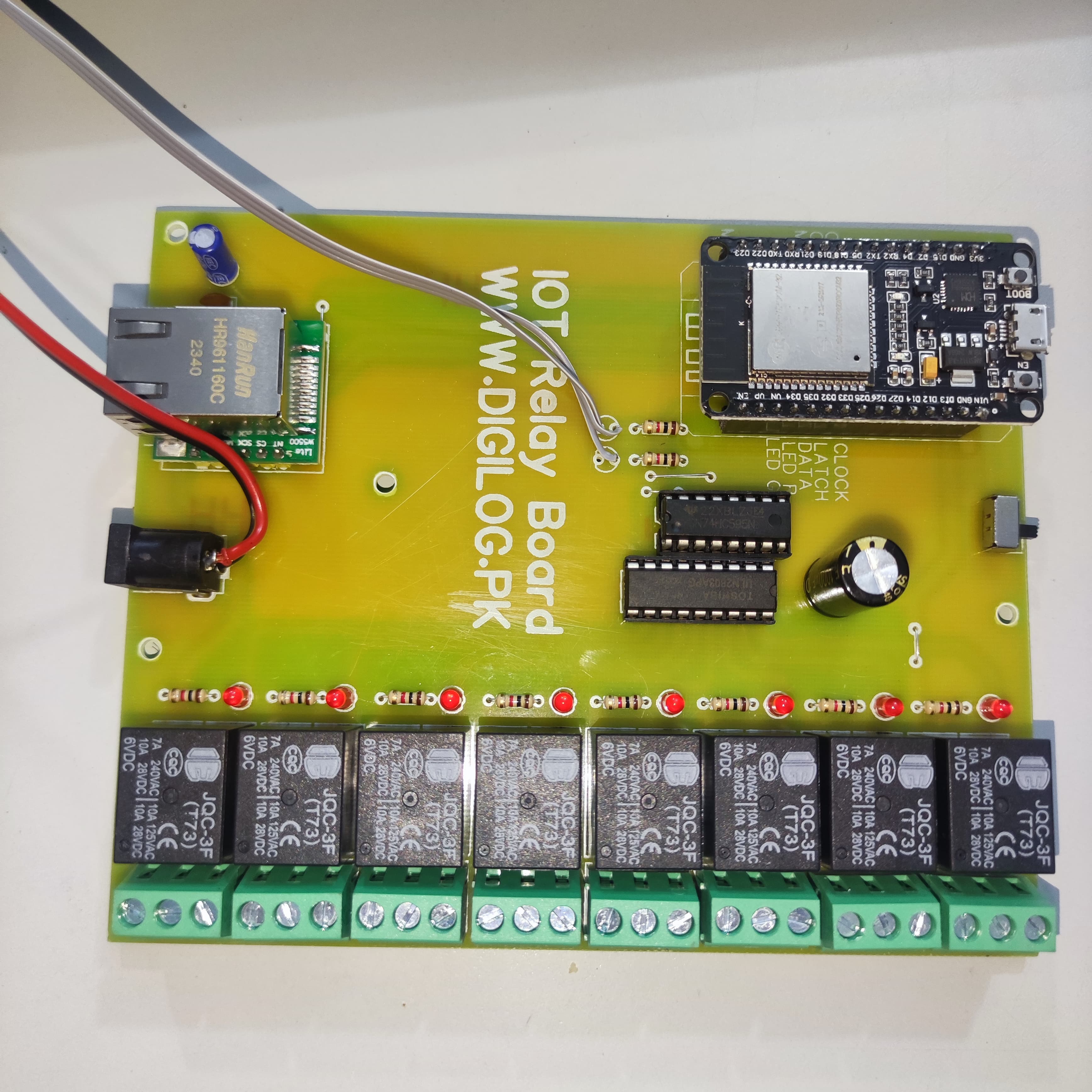ESP32 Based 8 Channel Relay Board Micro Controller Board WiFi LAN Bluetooth - a yellow circuit board featuring an ESP32 microcontroller, an Ethernet port, eight relays, and screw terminals.
