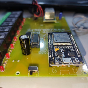 ESP32 Based 8 Channel Relay Board Micro Controller Board WiFi LAN Bluetooth - a yellow PCB with an ESP32 microcontroller, eight black relays, a black capacitor, and a micro USB port.