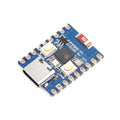 ESP32 C3 Mini Development Board With 2.4GHz Wi-Fi, Bluetooth 5 - rectangular circuit board with a USB-C port, two push buttons, and a central chip, viewed from a high angle.