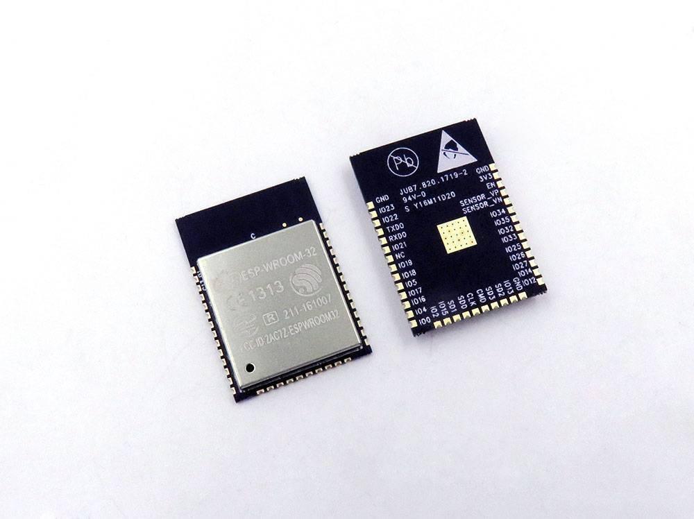 ESP32 ESP-wroom-32 - shown from the front with a metal shield and from the back displaying the printed pinout labels on a black circuit board.